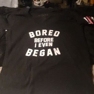 black yshirt with pink and white stripes on sleeve